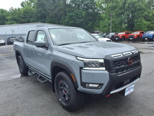 2025 Nissan Frontier Crew Cab 4x4 PRO-4X in Boulder Gray Pearl — front three-quarter view
